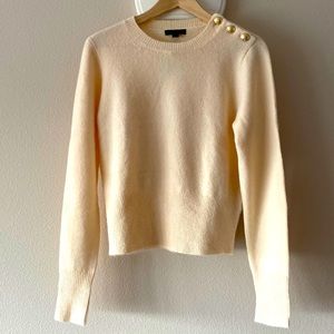 Crewneck sweater with shoulder buttons
